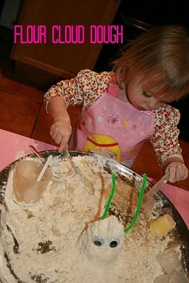  photo Child playing with cloud dough.jpg