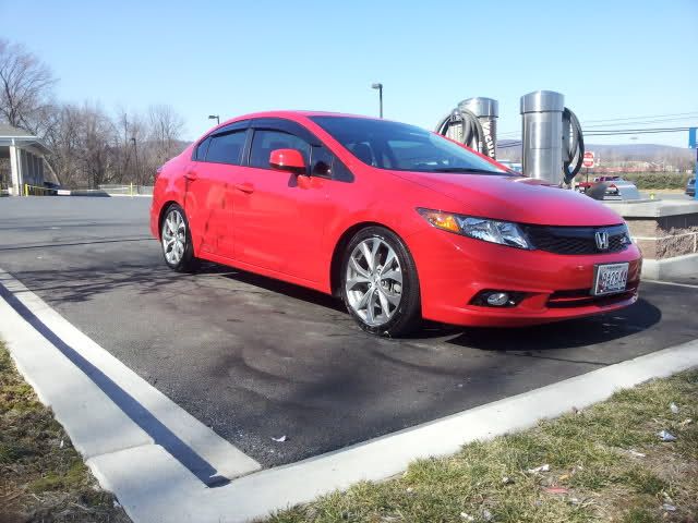 Red civic si lowered on redshift coilovers 